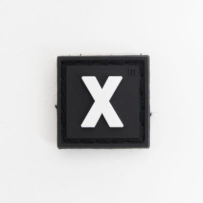 Compra Parche letra X en click.gt